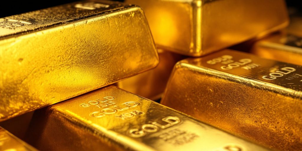 Barres d'or empilées sur un fond sombre.