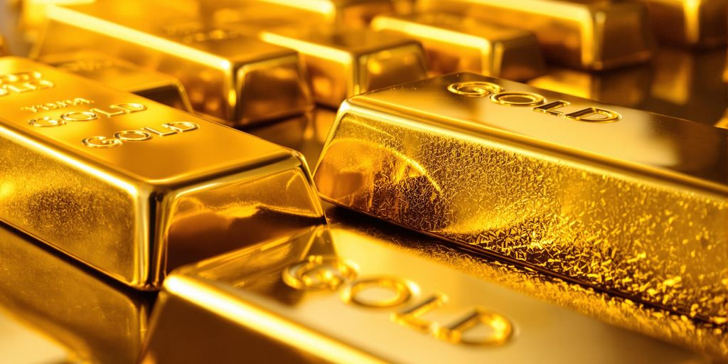Plan rapproché de barres d’or étincelantes sur fond sombre brillant