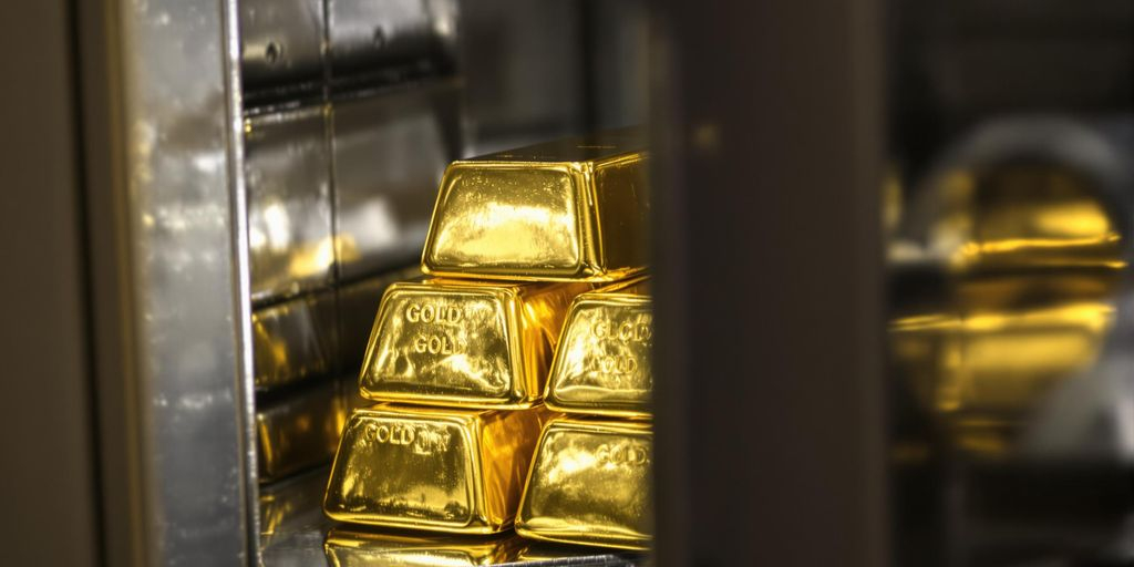 Lingots d'or dans un coffre-fort