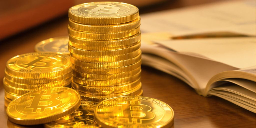 Pièces d'or empilées avec documents fiscaux