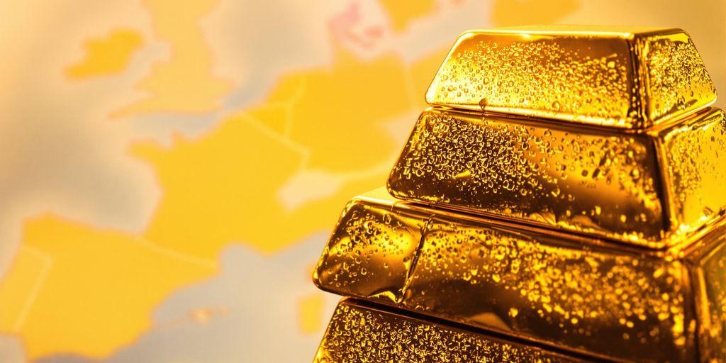 Lingots d'or empilés, Europe en arrière-plan.