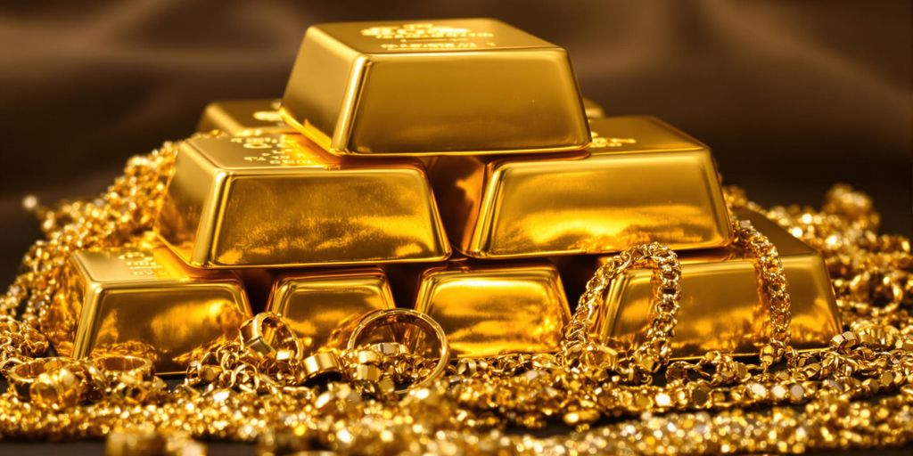 Lingots d'or, bijoux en or sur fond sombre