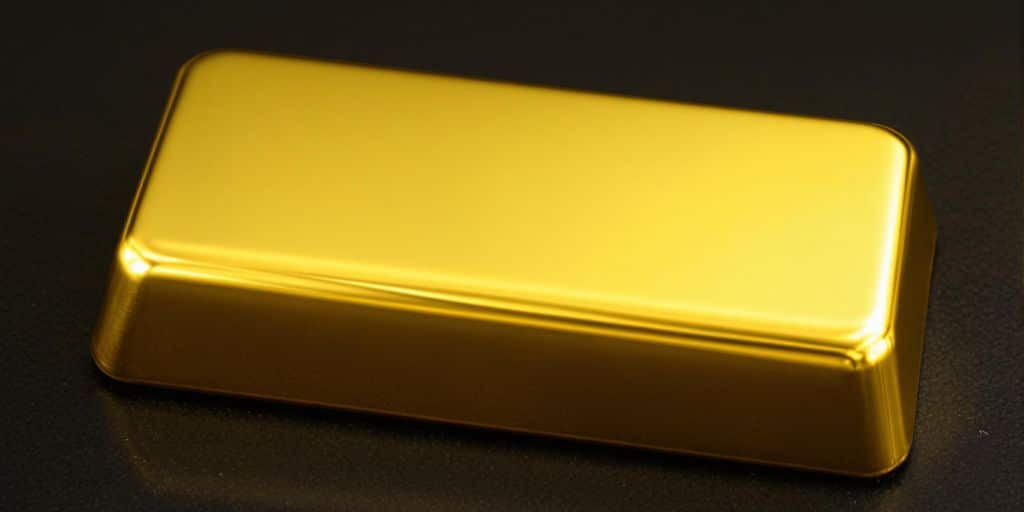 Lingot d'or brillant sur fond sombre