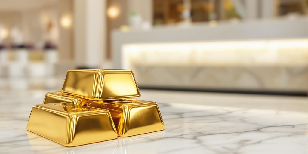 Lingots d'or brillants sur fond bancaire
