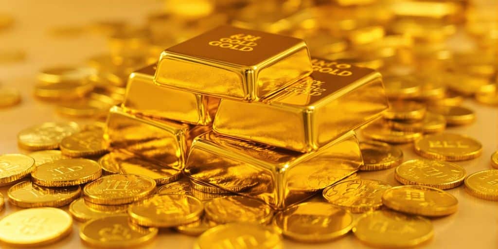 Lingots d'or brillants et pièces
