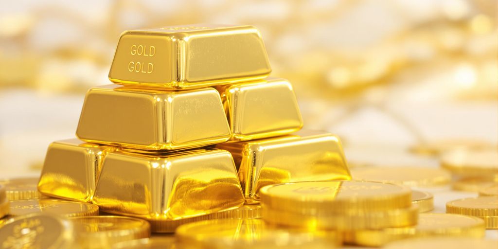 Lingots et pièces d'or empilés