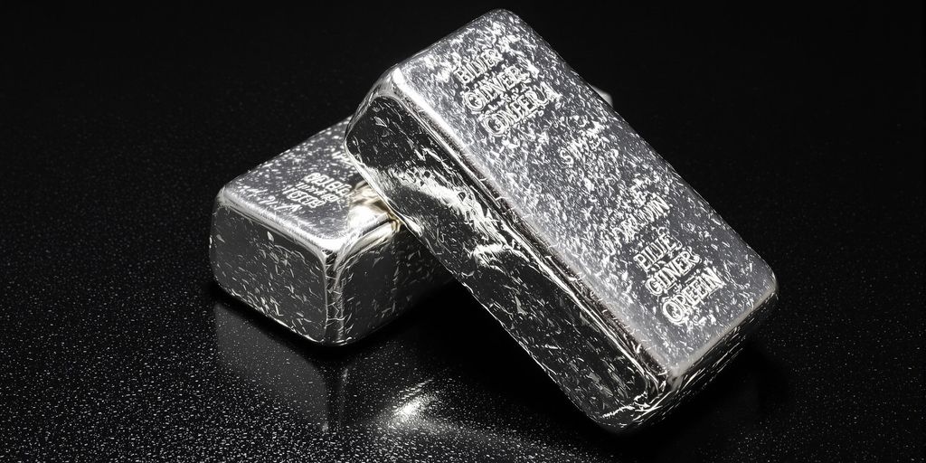 Deux lingots d'argent, l'un plus brillant que l'autre.