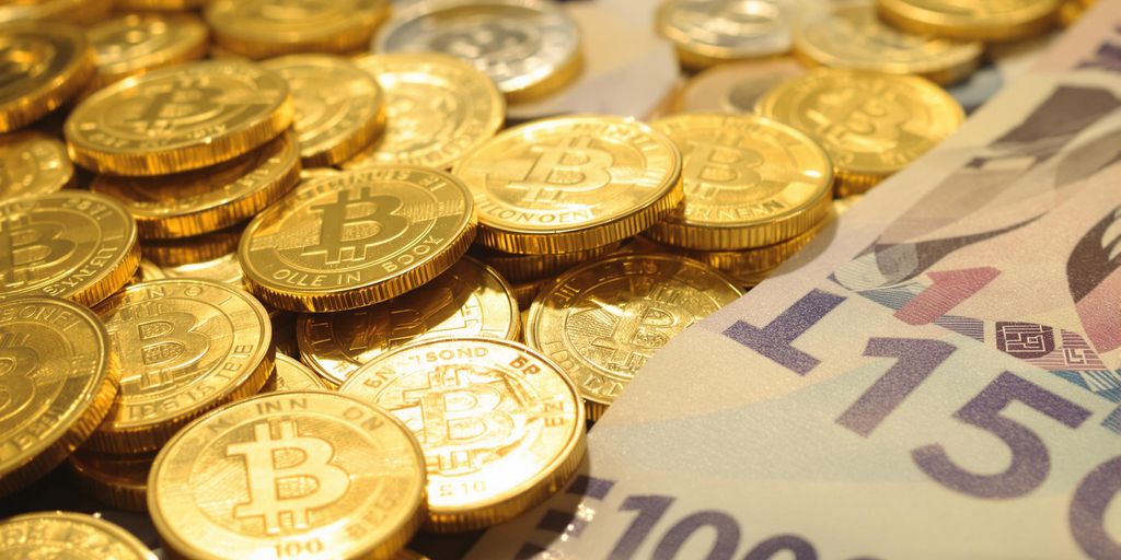 Pile de pièces d'or et billets de banque