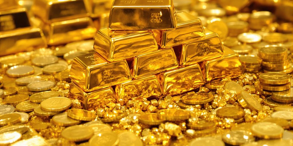 Lingots d'or, pièces et pépites brillantes