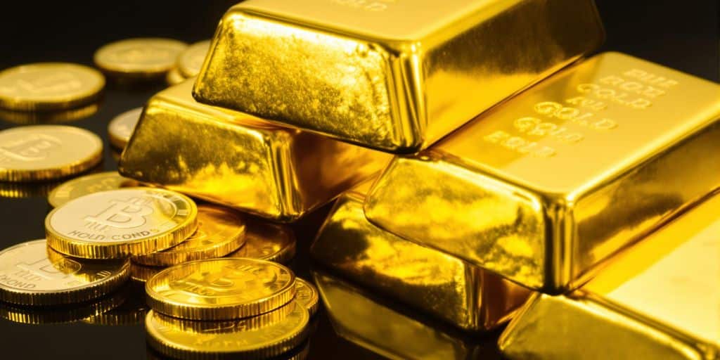 Lingots d'or et pièces d'or scintillantes