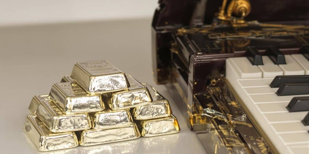 Lingots d'argent et clés de piano