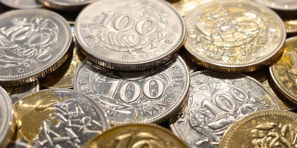 Pièces de 100 francs en argent, millésimes variés.