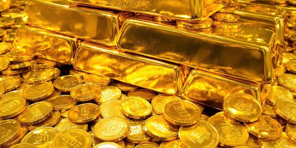 Lingots d'or brillants et pièces d'or
