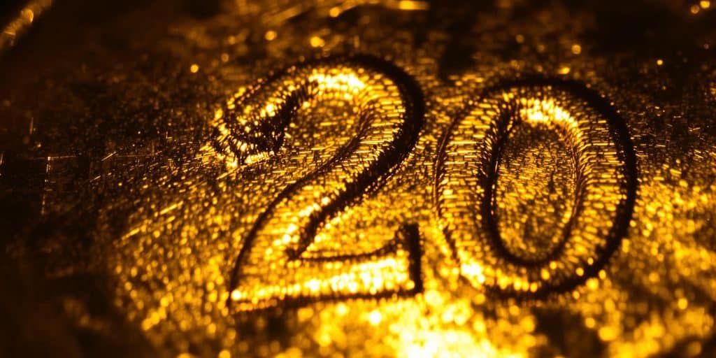 Pièce d'or de 20 dollars avec des reflets dorés.