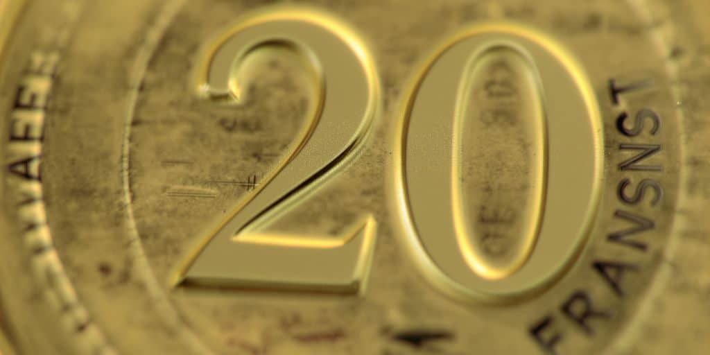 Gros plan d'une pièce d'or suisse de 20 francs.