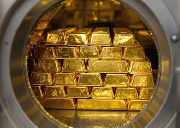 Lingots d'or dans un coffre-fort sécurisé.