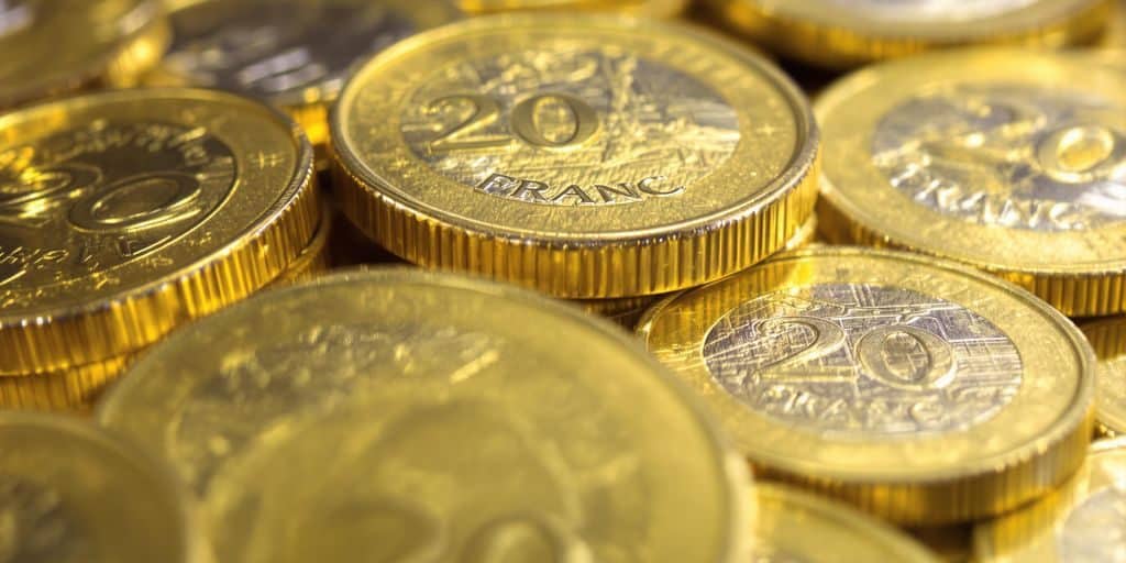 Pile de pièces de 20 francs suisses.