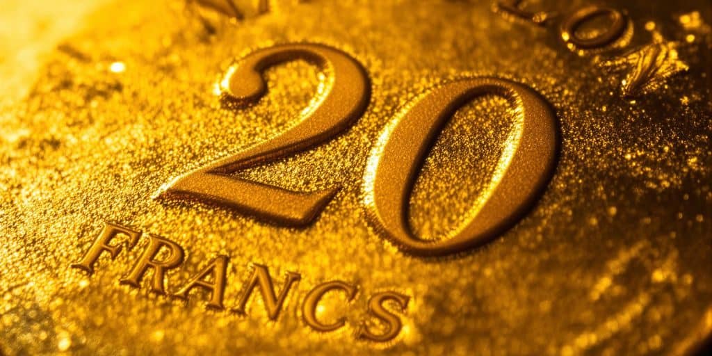 Une pièce Napoléon Or 20 Francs dorée.
