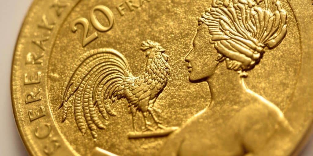 Pièce dorée de 20 Francs Marianne Coq gros plan.