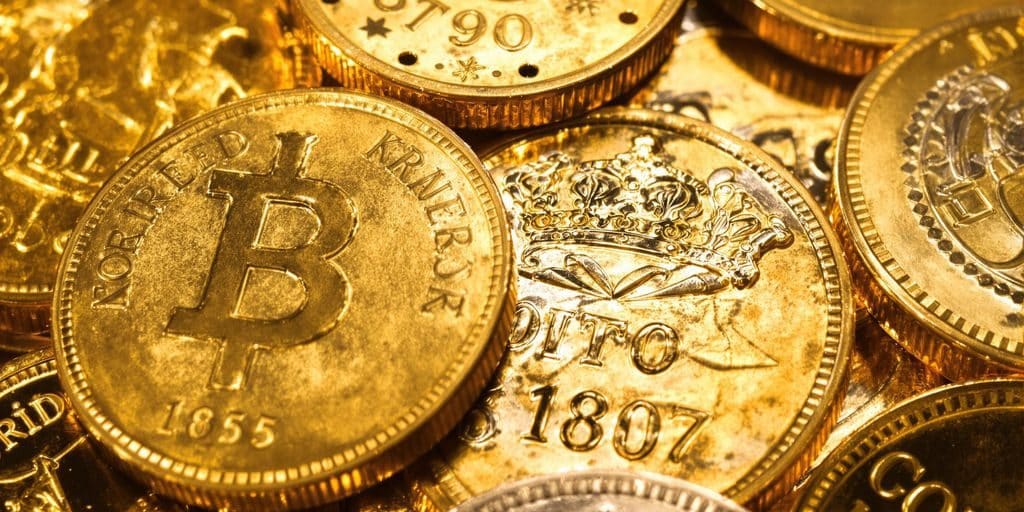 Pièces d'or Krugerrand et pièces commémoratives anciennes.