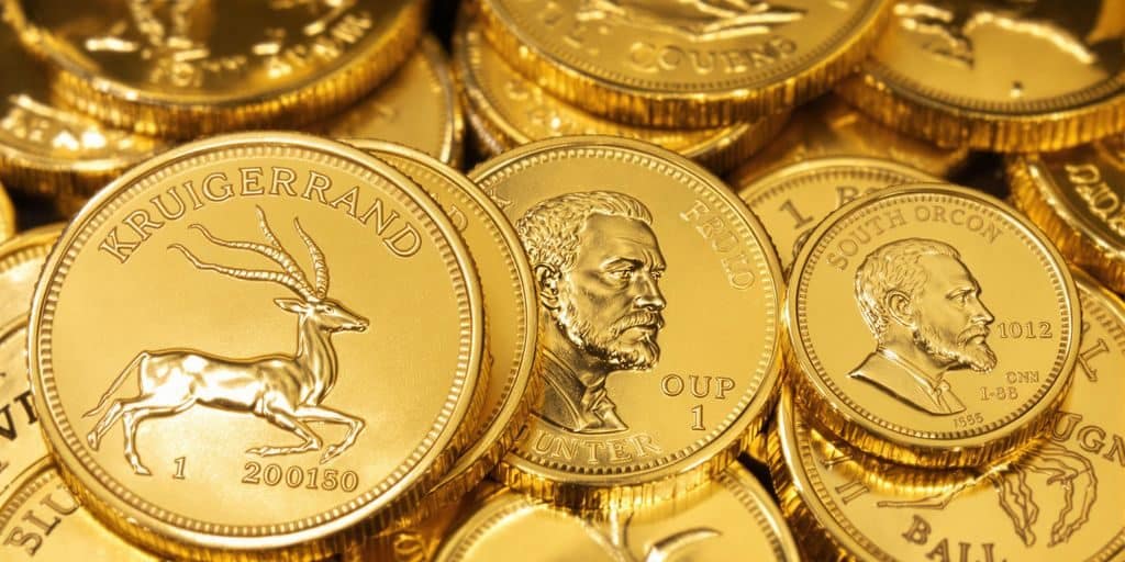 Pièces Krugerrand d'or de différentes tailles.