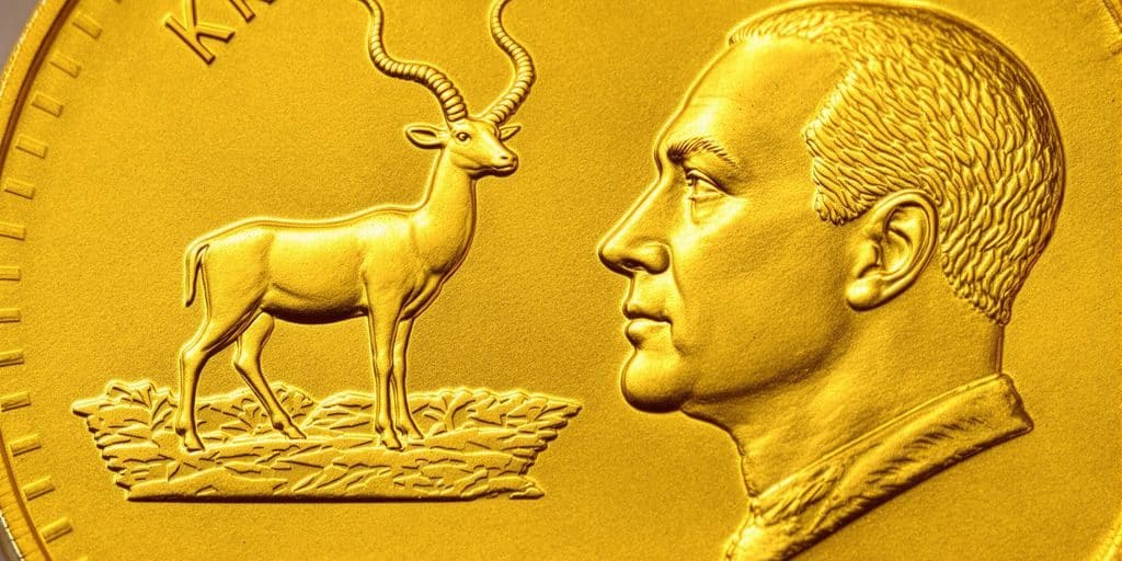 Pièce Krugerrand dorée avec des détails en relief.