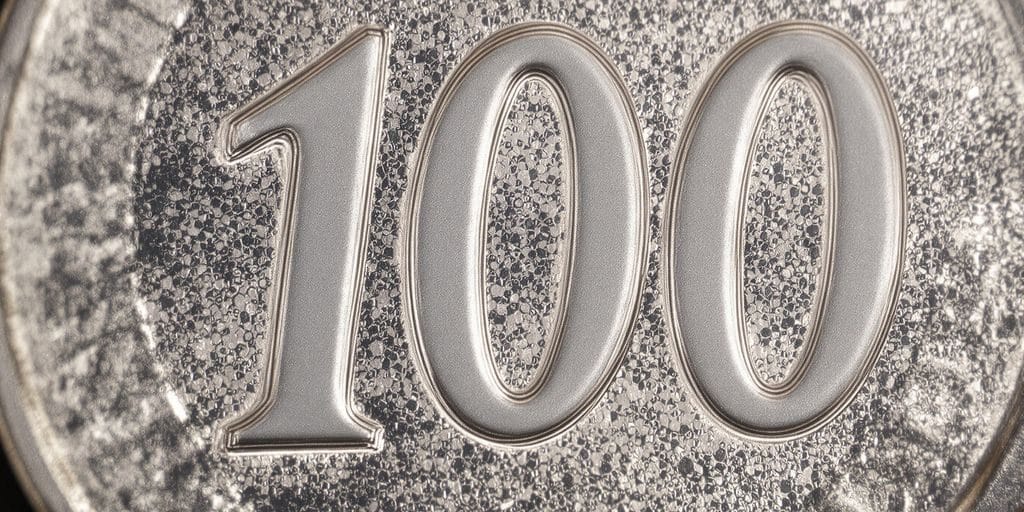 Pièce de 100 francs en argent rapprochée.